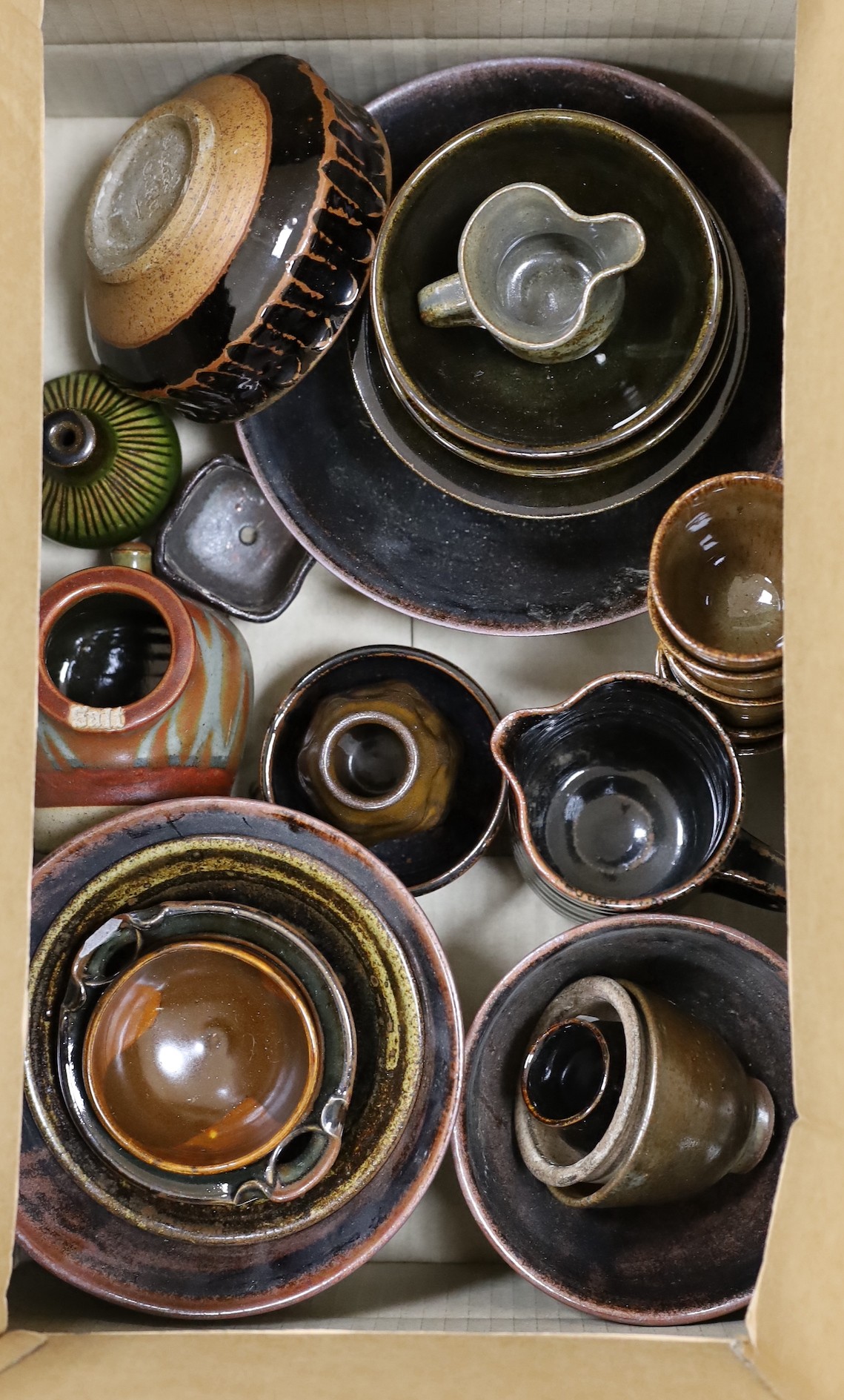 A large quantity of mixed studio pottery bowls, vases, etc.